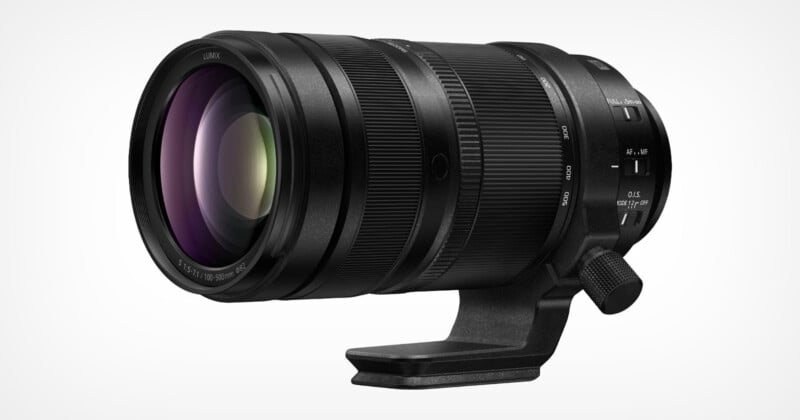 Panasonic Lumix S 100-500mm f/5-7.1 OIS telephoto zoom lens with tripod mount attached, showing zoom and focus rings.
