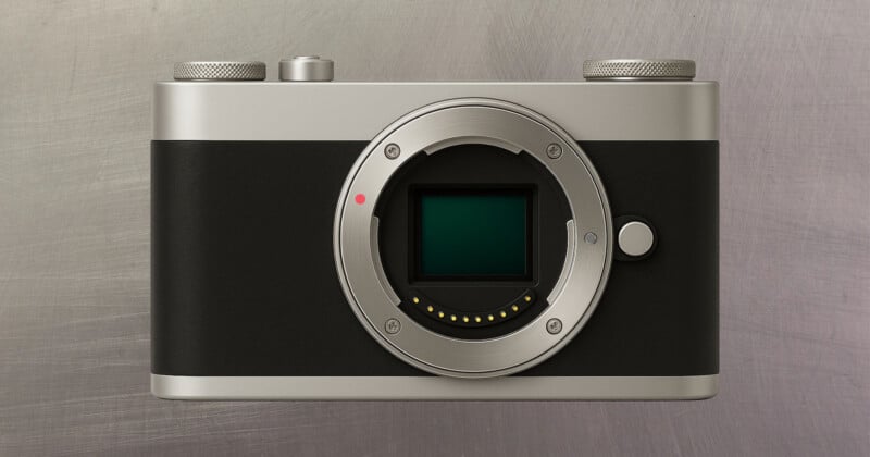 Esquisse Camera 전면 이미지 – 실버와 블랙 투톤 디자인의 마이크로 포서즈 카메라, 렌즈가 장착되지 않은 상태에서 센서와 마운트가 드러난 모습